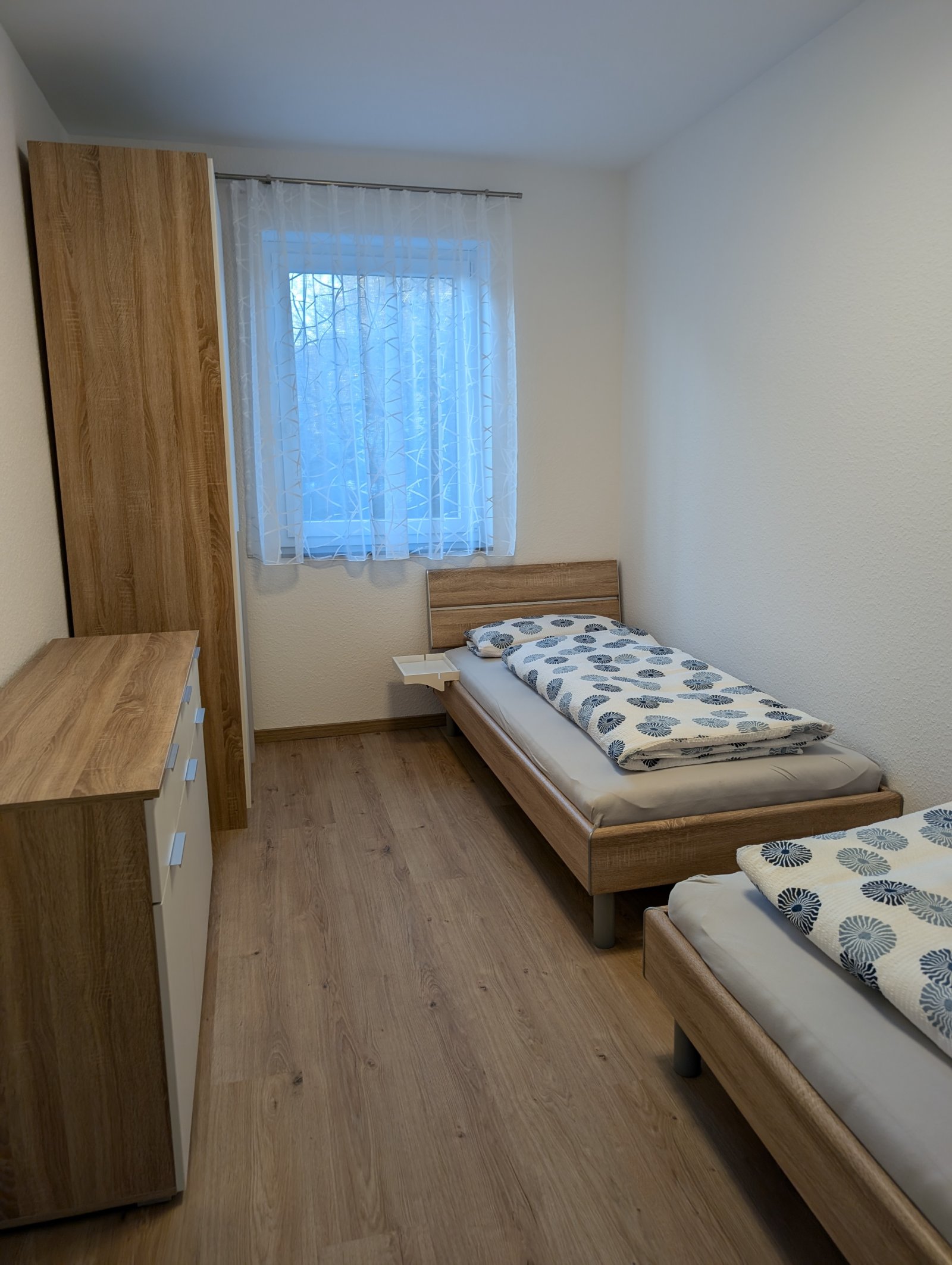 Schlafzimmer mit 2 Einzelbetten